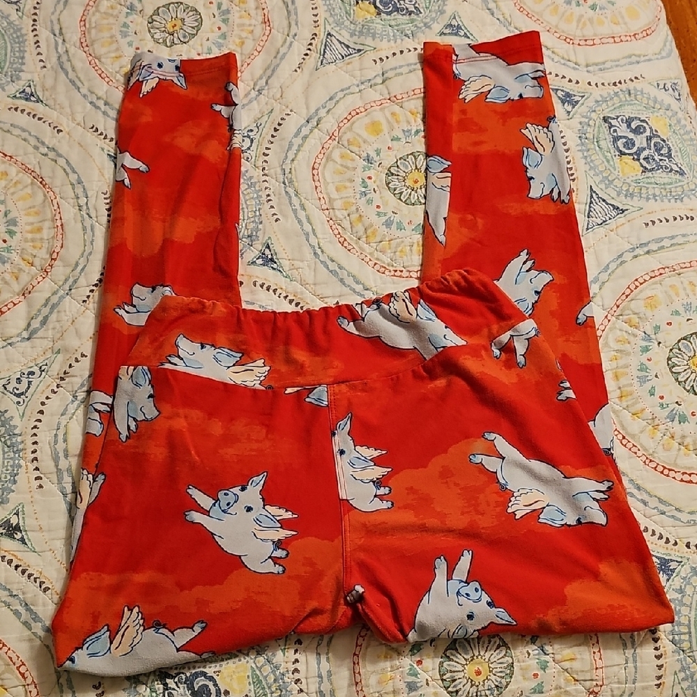 Red LuLaRoe Leggings with Flying Pig Print